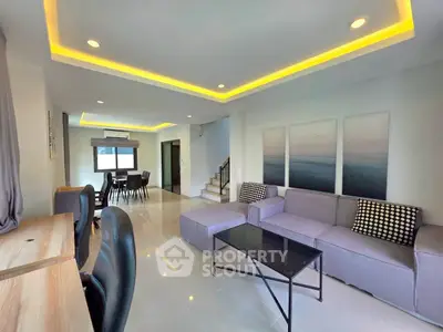 Modern living room with stylish lighting and spacious seating area