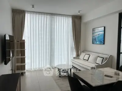 Modern living room with elegant decor and natural light