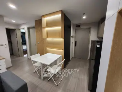 Modern apartment interior with sleek dining area and stylish lighting