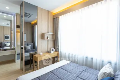 Modern bedroom with large window and stylish wooden furniture