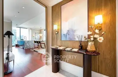 Luxurious modern apartment interior with elegant decor and open kitchen layout.