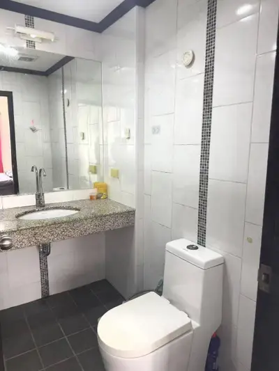 Modern bathroom with sleek design and granite countertop