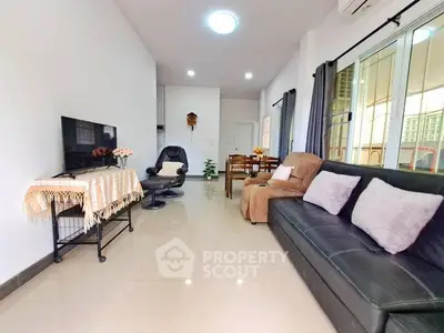 Spacious living room with modern furniture and natural light