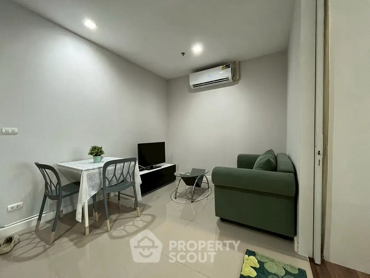 Cozy living room with modern furniture and air conditioning