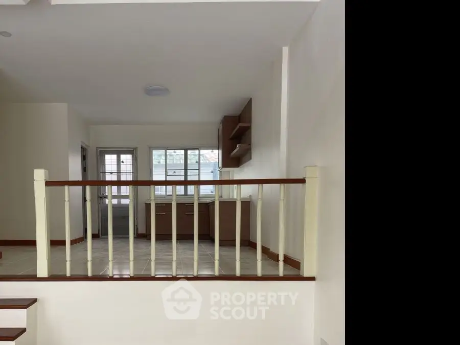 Charming interior with open layout and modern kitchen, perfect for cozy living.