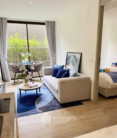 Modern living room with stylish decor and large window view