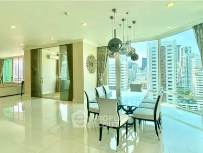 Luxurious dining area with panoramic city views and elegant decor