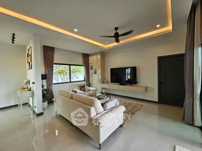 Spacious modern living room with elegant decor and natural light