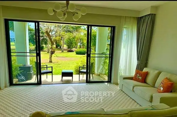 Spacious living room with garden view and elegant decor