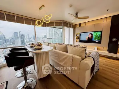 Luxurious high-rise living room with city view, modern decor, and elegant lighting.