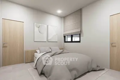 Modern minimalist bedroom with neutral tones and cozy bedding