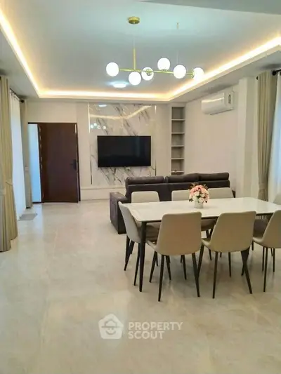 Luxurious modern living room with elegant dining area and stylish lighting