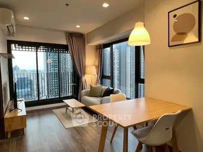 Modern living room with city view and stylish furniture