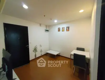 Cozy living room with modern decor and dining area