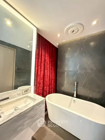 Luxurious bathroom with elegant freestanding bathtub and marble sink