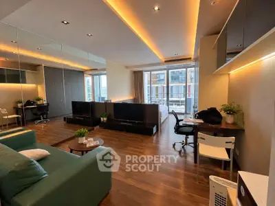 Modern open-layout living room with stylish decor and city view, perfect for urban living.