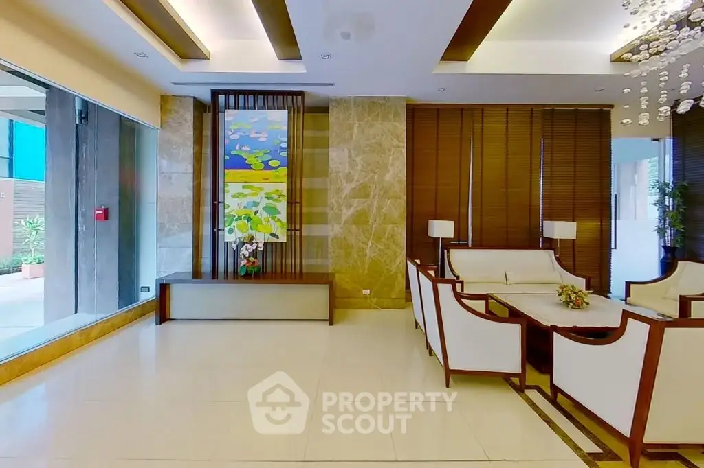 Luxurious modern lobby with elegant seating and artistic decor