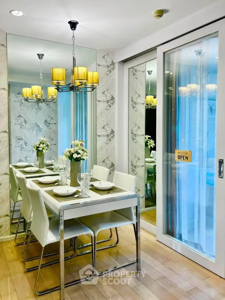Elegant dining area with modern decor and stylish lighting in a luxurious apartment.