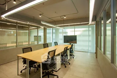 Modern office space with sleek design and ample natural light