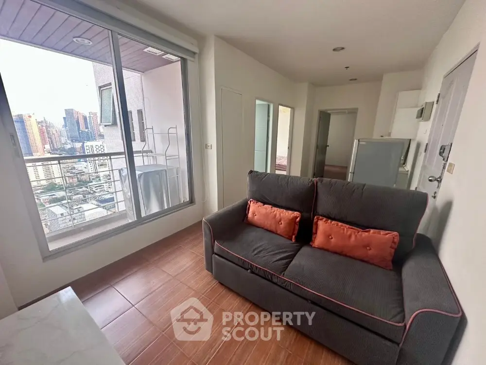 Modern apartment living room with city view balcony and cozy sofa