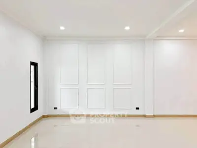 Spacious empty room with elegant white walls and glossy tiled flooring, perfect for customization.