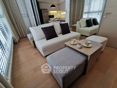 Modern living room with cozy seating and stylish decor