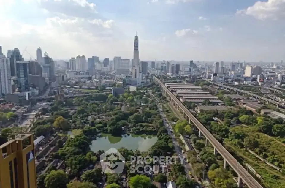 Stunning cityscape view with lush greenery and urban skyline, perfect for real estate investment.