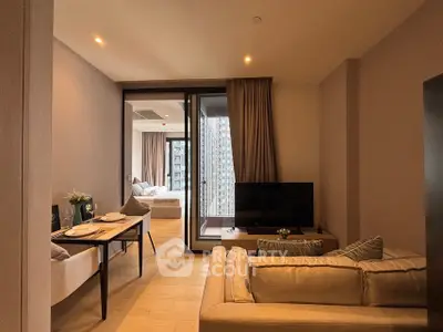 Modern living room with cozy seating and dining area, open to a bedroom with city view.