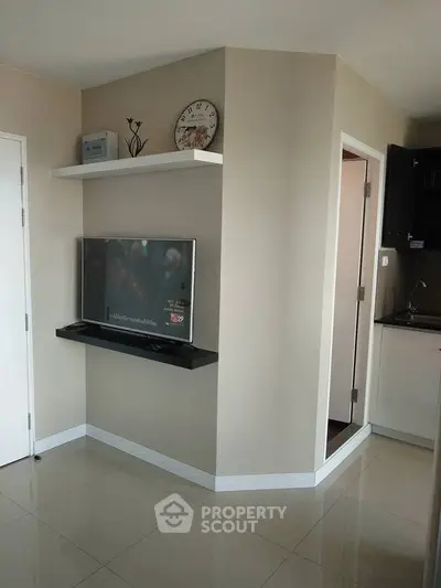 Modern living room with sleek TV setup and minimalist decor