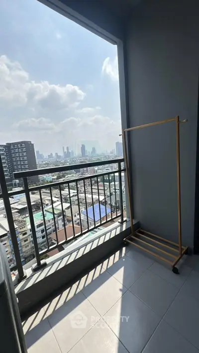 Spacious balcony with stunning city view, perfect for relaxation and enjoying the skyline.
