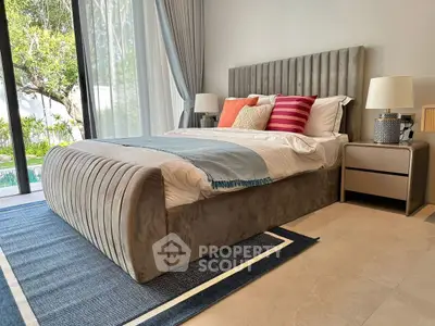 Luxurious bedroom with modern decor and pool view