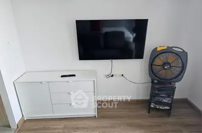 Modern living room with sleek TV and stylish decor