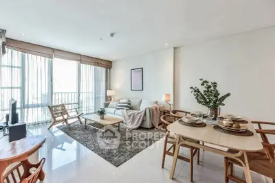 Spacious modern living room with elegant decor and natural light