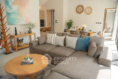 Spacious modern living room with stylish decor and cozy seating area