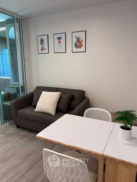 Modern living room with cozy sofa and stylish decor