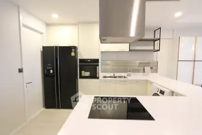 Modern kitchen with sleek appliances and open layout design
