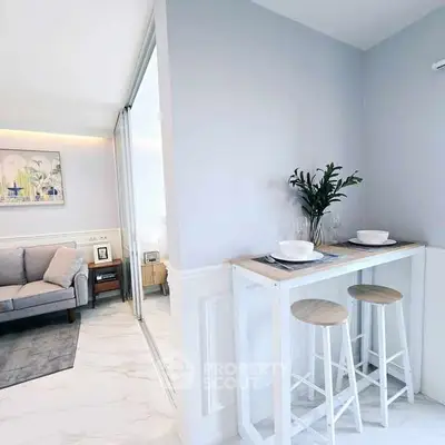 Modern living room with cozy dining nook and stylish decor