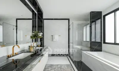 Luxurious modern bathroom with elegant black and white marble design