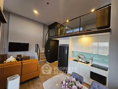 Modern loft apartment with stylish kitchen and cozy living area