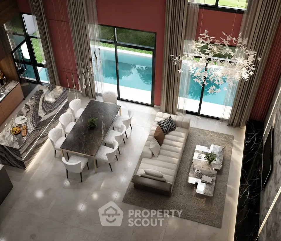 Luxurious open-plan living room with pool view, elegant dining area, and modern decor.