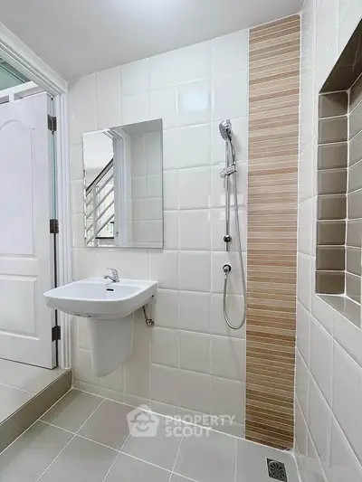 Modern bathroom with sleek tiles and minimalist design