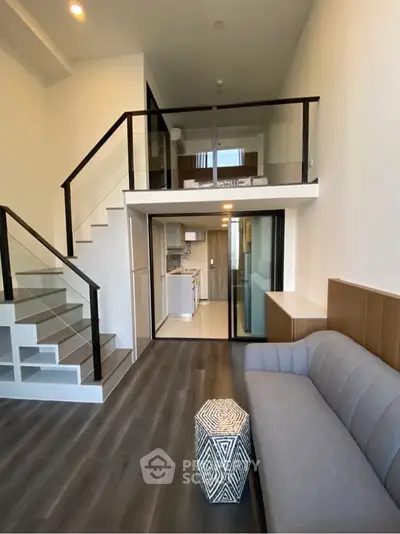 Modern duplex apartment with stylish living room and open kitchen layout