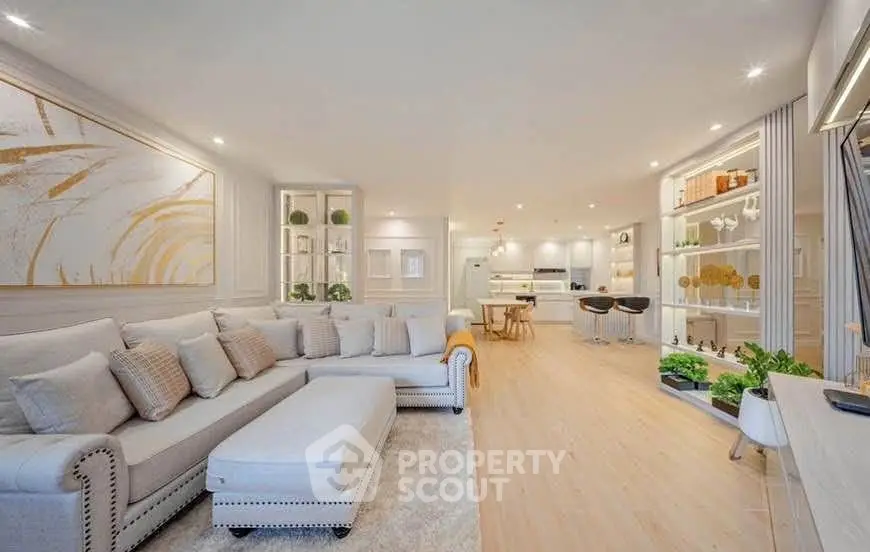 Spacious modern living room with open kitchen and elegant decor