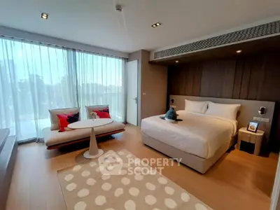 Luxurious modern bedroom with large windows and stylish decor