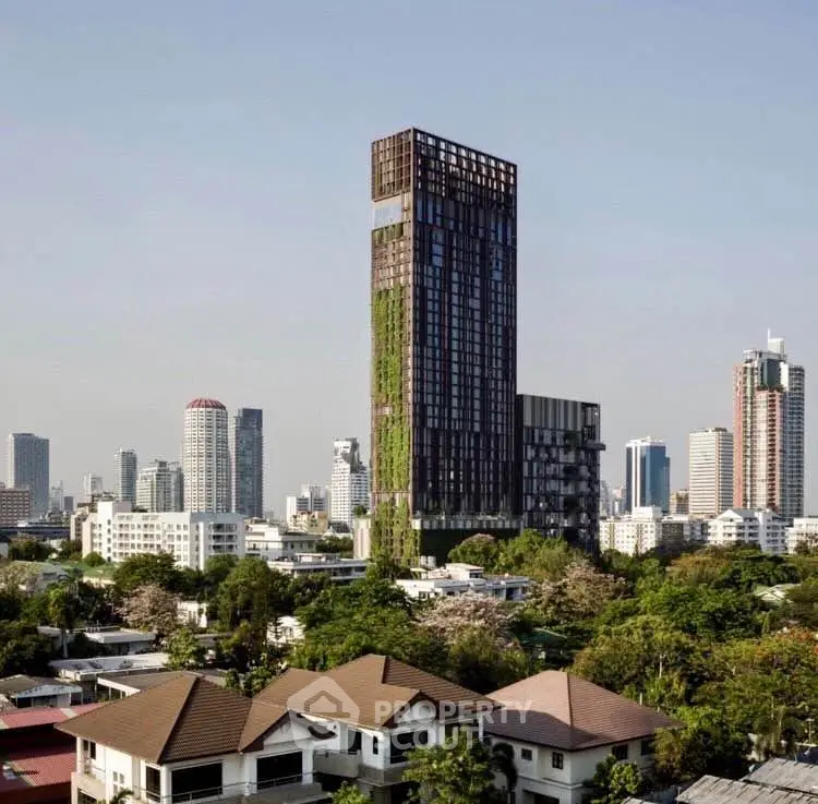 Stunning modern skyscraper with lush vertical garden in vibrant cityscape.
