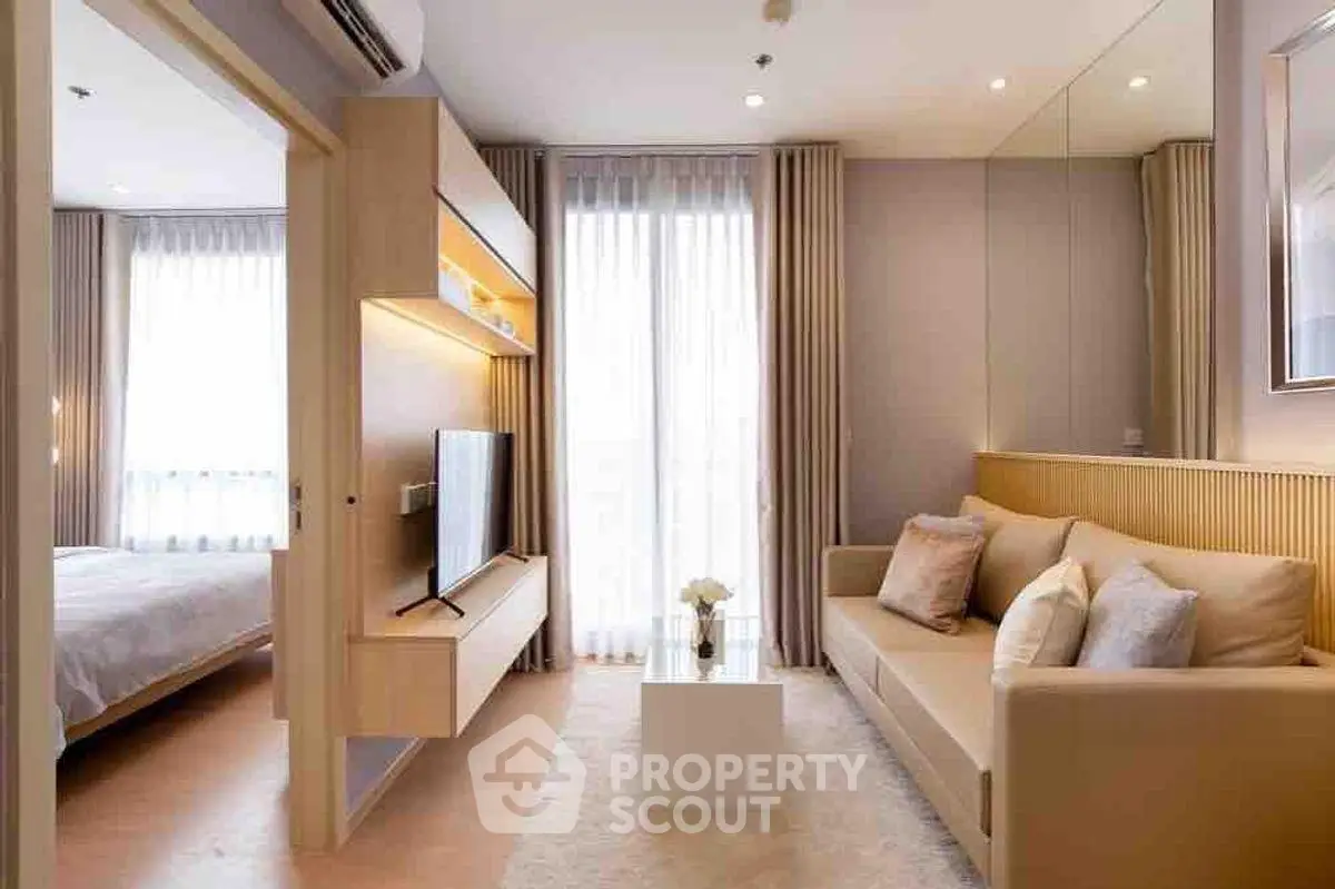 Modern living room with cozy sofa and stylish decor in bright apartment