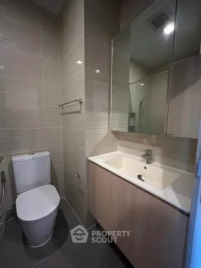 Modern bathroom with sleek fixtures and neutral tones