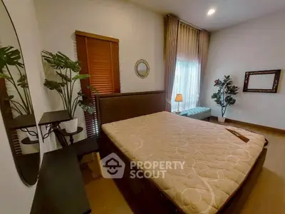 Cozy bedroom with elegant decor and natural light