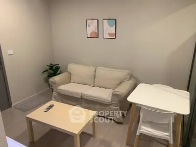 Cozy living room with beige sofa and modern decor