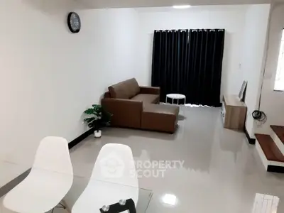 Modern living room with sleek furniture and minimalist decor